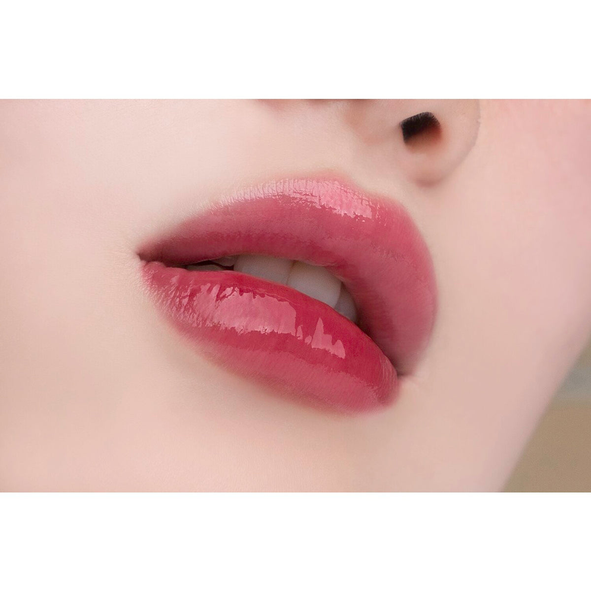 A vibrant TPSY Juicy Lip Plumper tube, 6g of lip-enhancing magic for a fuller, shinier pout.