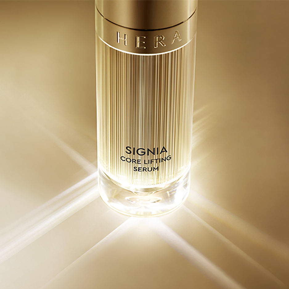 a bottle of perfume sitting on top of a table