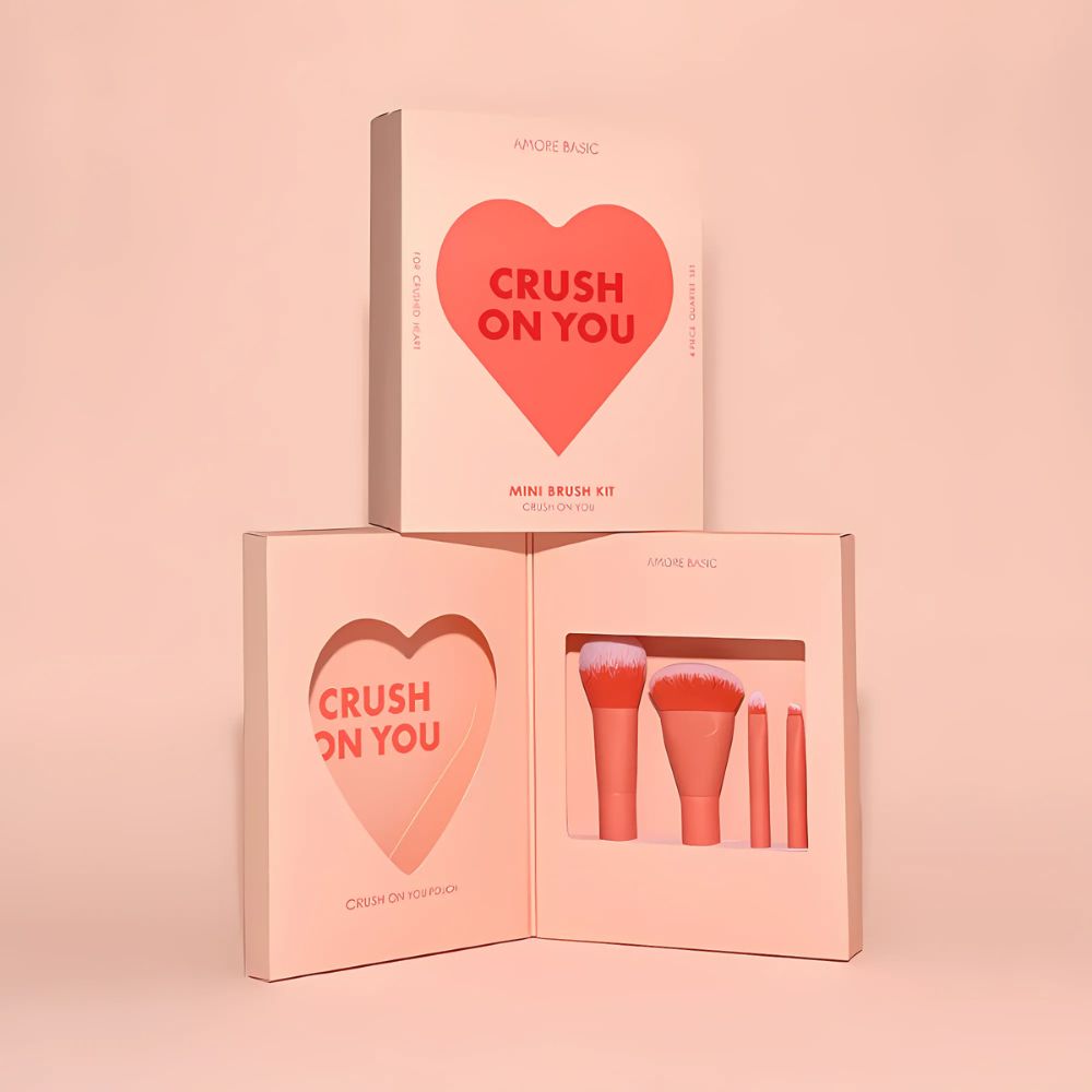 The AMORE BASIC Crush On You Mini Brush Kit is a travel-friendly set of essential makeup brushes, perfect for achieving a flawless look on the go.