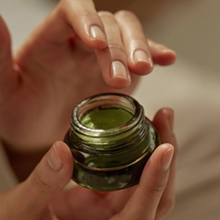 AROMATICA Unburden Stress Relief Balm 17g, a calming balm that helps relieve stress and enhance overall well-being.