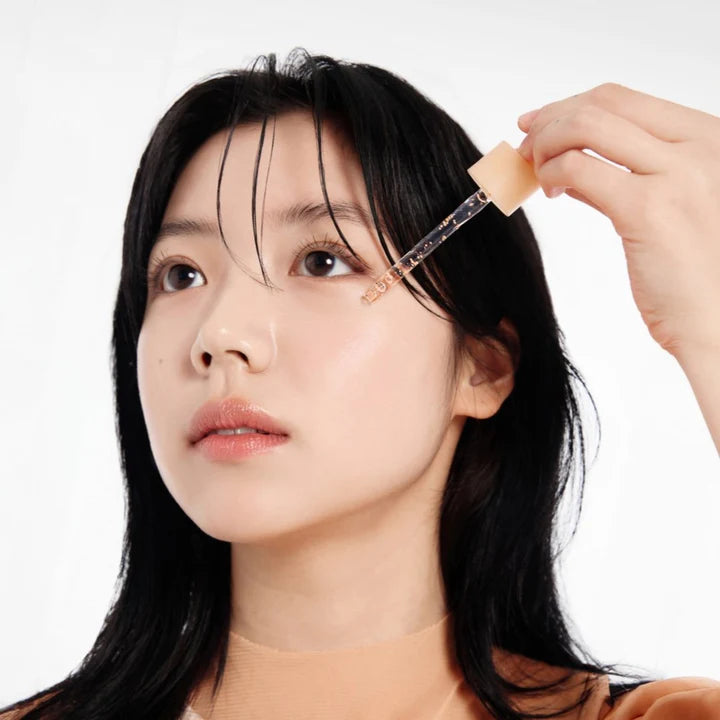 Abib Glutathiosome Dark Spot Serum Vita Drop 50ml- skincare product in a sleek bottle designed to target dark spots effectively.