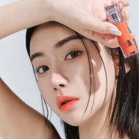 BANILA CO Dew Glow Tint 3.8g: A vibrant lip tint offering a dewy finish for a fresh, radiant look.