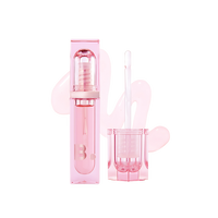 A sleek tube of BANILA CO Veil Gloss, 3.9g, showcasing a glossy finish perfect for a radiant lip look.