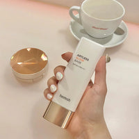 Functions as a primer and illuminator, enhancing the skin's natural radiance