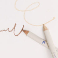 This innovative product combines a concealer and a brightener in one pencil, making it ideal for both concealing imperfections and adding subtle brightness to the eyes.