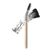The TOOL LAB 208 Eyelash & Brow Brush is a specialized tool designed for precise grooming and styling of eyelashes and eyebrows.