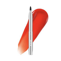 It features a retractable design, allowing the brush head to extend and retract with a simple mechanism, keeping it clean and protected when not in use.