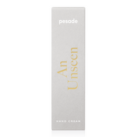 A 50ml container of Pesade An Unseen Hand Cream, formulated to deeply moisturize and protect hands from dryness.