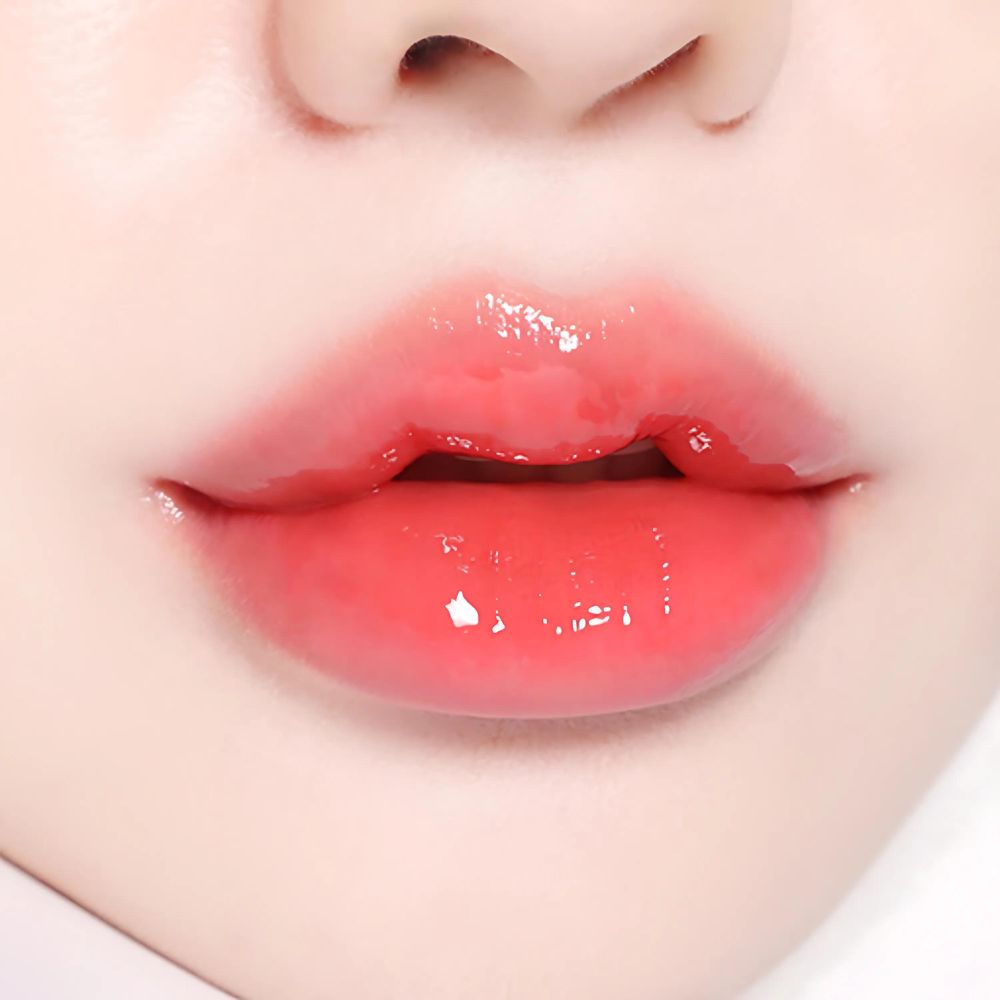 espoir Couture Lip Tint Glaze 5.5g in 02 Odd Coral Shade.