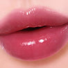 too cool for school Verre Color Gloss 2.6g in 06 Plum Shot Shade.