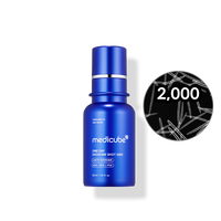 a blue bottle of medicube with a black circle in the background