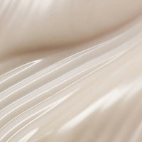 a close up of a white cloth with lines on it