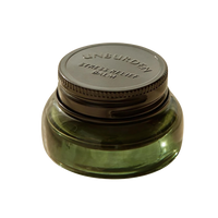 AROMATICA Unburden Stress Relief Balm 17g, a soothing balm designed to alleviate stress and promote relaxation.