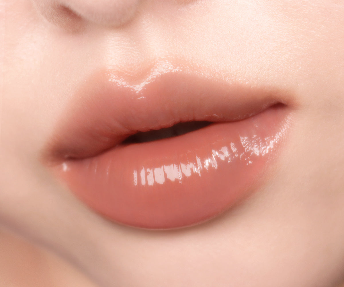 AOU Glowy Tint Balm shade of PEANUT BALM