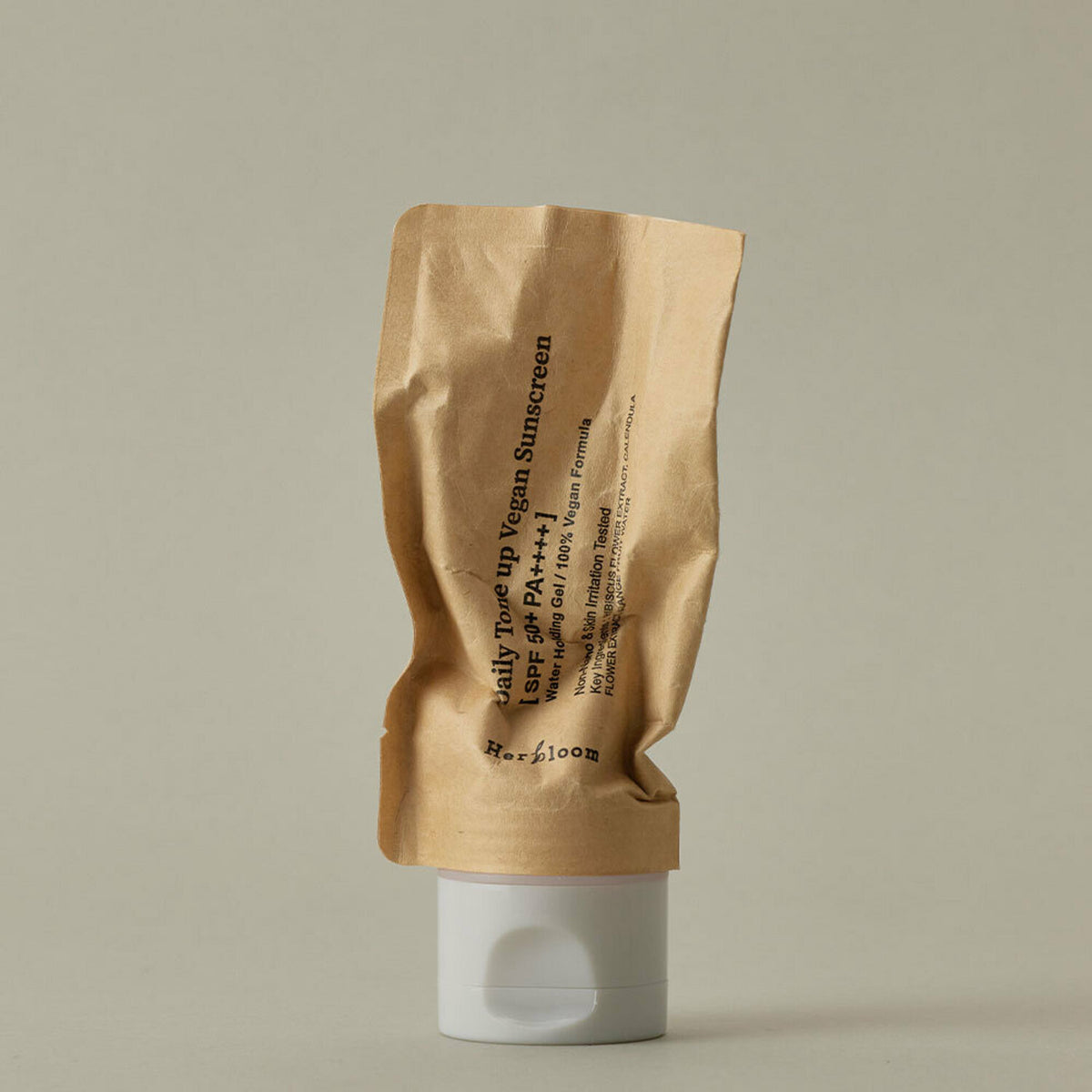 50ml Herbloom Daily Tone up Vegan Sunscreen in a sleek, eco-friendly bottle.