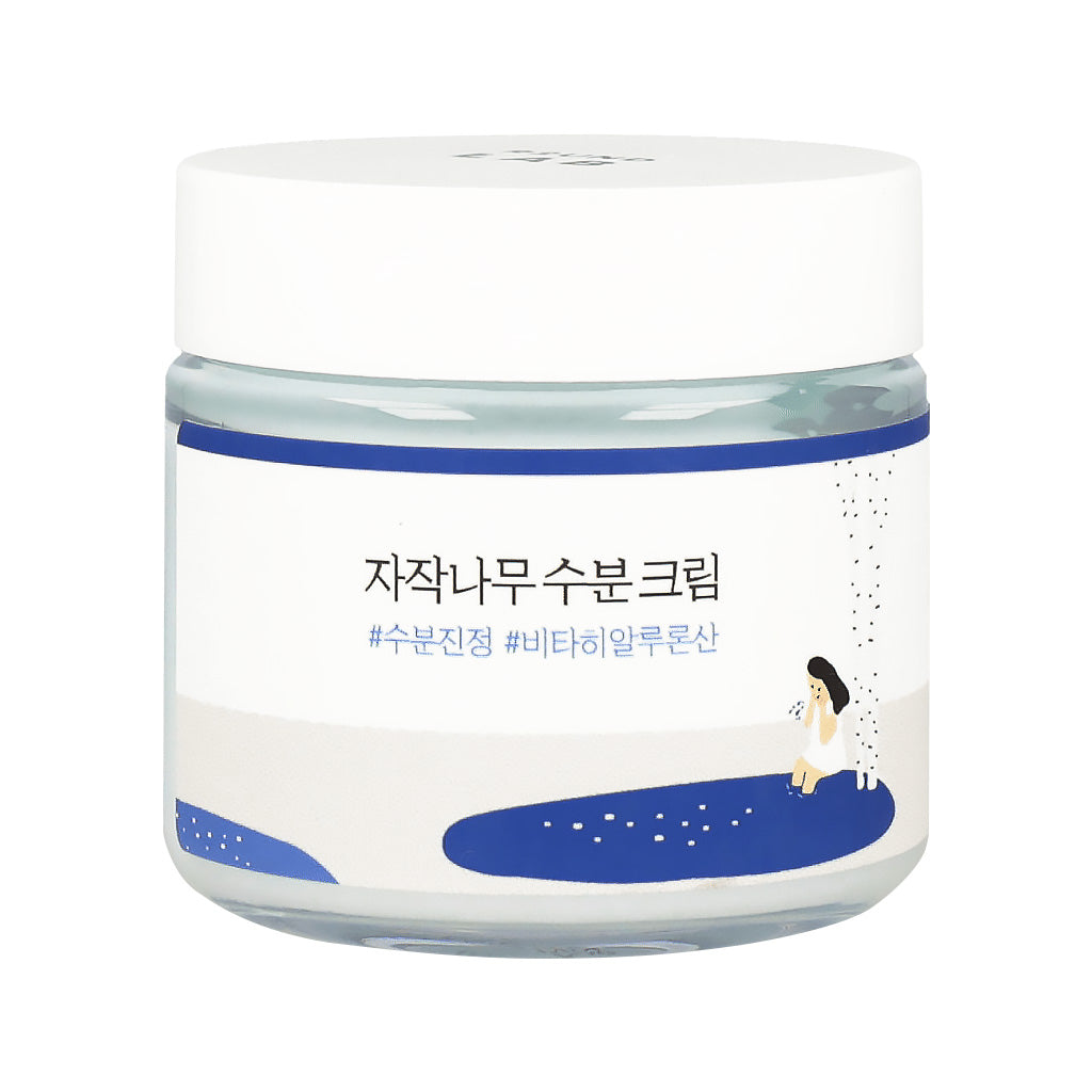 A jar of ROUND LAB Birch Juice Moisturizing Cream, labeled 'the face shop watery gel cream'.