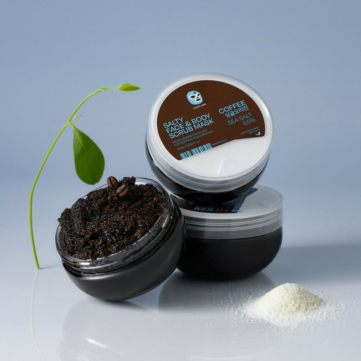 SalTherapy Salty Body Scrub 300g in a jar with pink label and sea salt crystals.