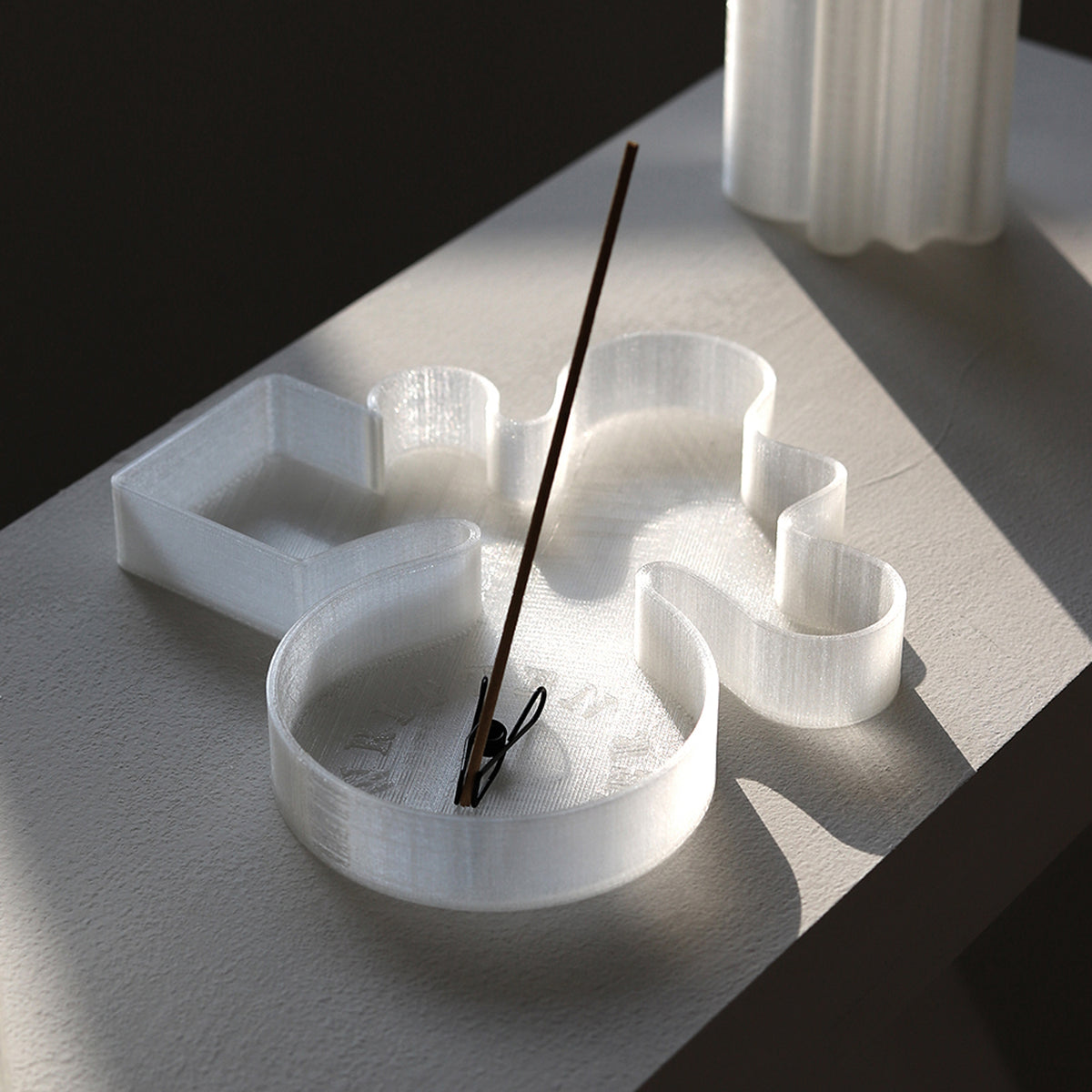 Escrito en palabras de agua palitos de incienso